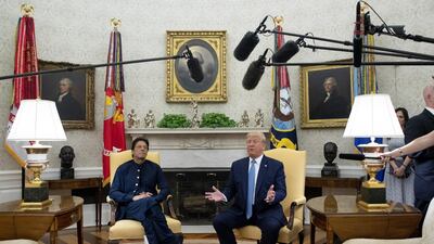 Donald Trump speaks alongside Imran Khan during a meeting in the Oval Office of the White House. Bloomberg