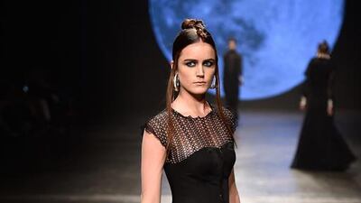 A model walks the runway at the Dany Tabet show. Pascal Le Segretain / Getty Images for Fashion Forward