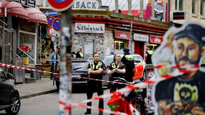 Police guard an area of Hamburg after an armed man was shot by officers. Reuters