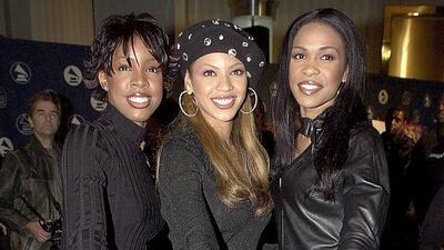 Michelle Williams, Beyonce and Kelly Rowland, in all black separates, at the 43rd annual Grammy nominations press conference on January 3, 2001 in Beverly Hills, California. Getty Images