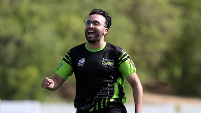 Dubai's Fahad Tariq after taking the wicket of ECB Blues' Rohan Mustafa. Chris Whiteoak / The National