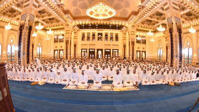 Sheikh Mohammed bin Rashid, Vice President and Ruler of Dubai, prays at Zabeel Mosque alongside his son, Sheikh Hamdan bin Mohammed, Crown Prince of Dubai, and other senior figures. Courtesy Wam