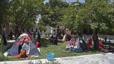 Afghan families who fled their homes as the Taliban closed in take refuge in tents in the courtyard of Wazir Akbar Khan mosque, Kabul. AFP