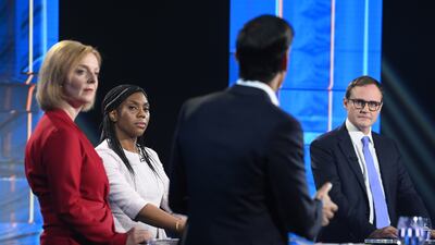 Former prime ministerial hopeful Tom Tugendhat, right, says he prefers Liz Truss, left, over rival candidate Rishi Sunak. Getty