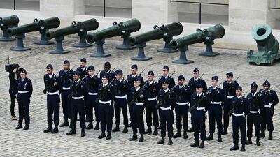 French Air and Space Force servicemen stand guard before the official welcoming ceremony at the Invalides, in Paris on May 6, 2024. AFP