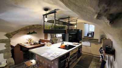 In the renovated kitchen, Burgon and Hunt dug up the original flagstone castle floor then relaid it in the same position over underfloor heating, making it more cosy ahead of a cold Scottish winter. Courtesy Kilmartin Castle