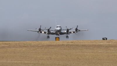 A Royal Australian Air Force AP3C Orion leaves RAAF Pearce Air Base in Perth, Australia. Rob Griffith / EPA / Pool