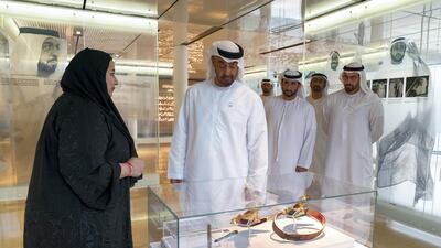 Sheikh Mohamed bin Zayed tours the Qasr Al Muwaiji exhibition. He is seen with Mohamed Khalifa Al Mubarak, Chairman of the Department of Culture and Tourism and Abu Dhabi Executive Council Member, right.