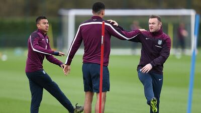 Jesse Lingard, Chris Smalling and captain Wayne Rooney. AFP