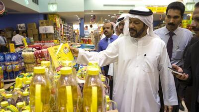 Dr Hashim Al Nuaimi, director of the Ministry of Economy’s consumer protection department, inspects the LuLu Centre in UAQ. Antonie Robertson / The National