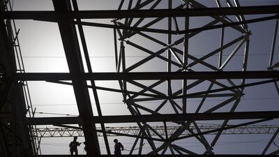 Scaffolding and temporary towers at the Louvre Abu Dhabi site on Saadiyat Island in Abu Dhabi. Until the canopy is finished, it will be held aloft by 118 temporary steel towers, each of which will support the super-sized steel elements above them on ‘ball and socket’ couplings, similar to the human hip joint. Silvia Razgova / The National