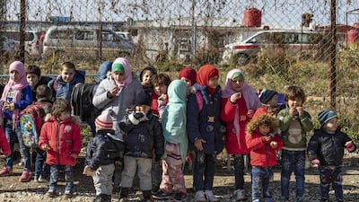 Orphans from various nationalities gather at the Kurdish-run Al Hol camp, home to thousands of relatives of Islamic State group fighters, in the Al Hasakeh governorate in northeastern Syria on January 25, 2020. AFP