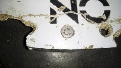 Debris thought to be from the missing Malaysia Airlines MH370 plane in a photo taken on February 28, 2016. The plane vanished mid-flight on March 8, 2014. Blaine Gibson / Australian Transport Safety Bureau / handout via Reuters