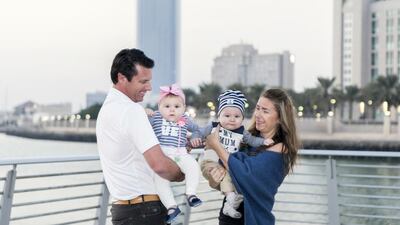 Berend Lens Van Rijn, his wife, Joanna, and their baby twins, Lilly and Leonard, at the Marasy Marina. Reem Mohammed / The National