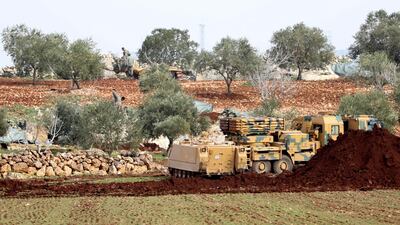 A view of Turkish soldiers and millitary armored vehicles at the Ad Dana district of north-east Idlib, Syria. EPA