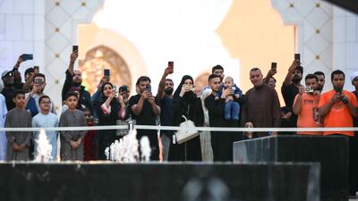 People gathered to watch the firing and take photos