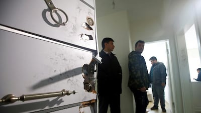 The door of a hideout where the alleged attacker of Reina nightclub was caught by Turkish police. Osman Orsal / Reuters