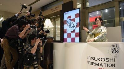 Japanese photographers take pictures of Toshiba’s humanoid robot ChihiraAico. FRANCK ROBICHON / EPA