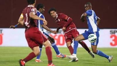 Mohammed Al Shehhi, centre, has a knack of appearing from nowhere on a football pitch, which won the Al Wahda forward the moniker of 'the Ghost'. Mike Young / The National