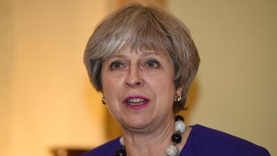 British prime minister Theresa May will be discussing borders and Brexit at a summit with French president Emmanuel Macron. Eddie Mulholland / AFP