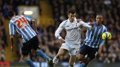 Tottenham's Gareth Bale skips past the Coventry back line during their FA Cup tie.