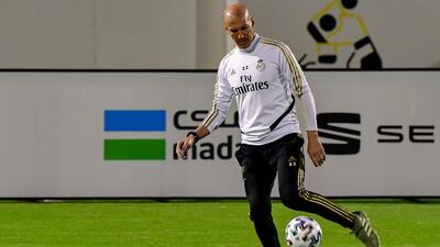 Real Madrid's French coach Zinedine Zidane shows his skill. AFP