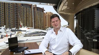 Julian Krickl, sales manager at Art Marine on one of their boats currently moored on The Palm Jumeirah. Antonie Robertson / The National