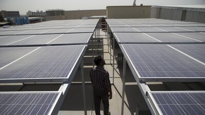 Rooftop solar panels on private homes and offices in Dubai. A think tank has found more moves to establish clean energy. Antonie Robertson / The National