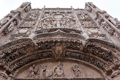 Carved figures in the facade of the National Sculpture Museum. Alamy