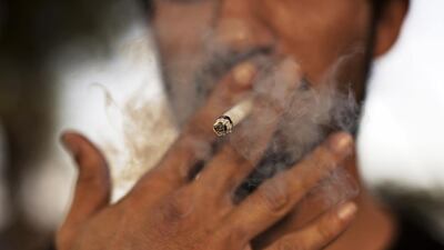 Tobacco-related diseases kill 6 million people each year, which will rise to more than 8 million by 2030. Christopher Pike / The National