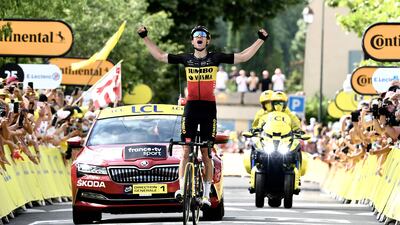 Team Jumbo Visma's Wout van Aert celebrates winning Stage 11 of the Tour de France on Wednesday, July 7.