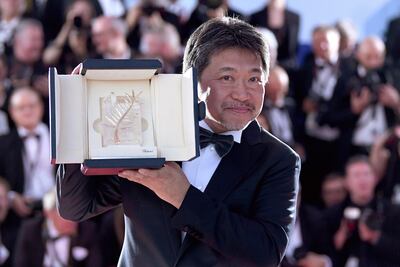 CANNES, FRANCE - MAY 19: Director Hirokazu Koreeda poses with the Palme d'Or award for 'Shoplifters' (Manbiki Kazoku) at the photocall the Palme D'Or Winner during the 71st annual Cannes Film Festival at Palais des Festivals on May 19, 2018 in Cannes, France. (Photo by Pascal Le Segretain/Getty Images)