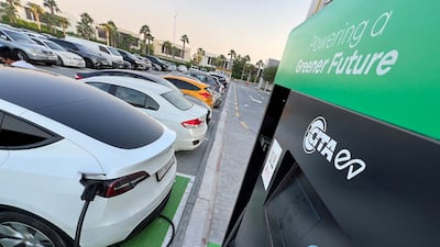 Electric vehicle charging networks are expanding and battery efficiency is improving in the UAE. Chris Whiteoak / The National