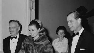 Rainier III, Prince of Monaco, stands with his wife, US actress Grace Kelly (1929 - 1982), and Prince Philip at the Opera de Monte-Carlo, Monaco, in 1966. Reg Lancaster/Daily Express/Hulton Archive/Getty Images