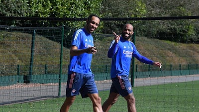 Pierre-Emerick Aubameyang and Alex Lacazette prepare for the Arsenal training session. Getty