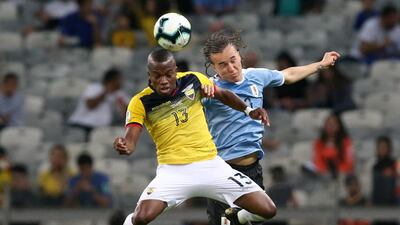 Soccer Football - Copa America Brazil 2019 - Group C - Uruguay v Ecuador - Mineirao Stadium, Belo Horizonte, Brazil - Ecuador's Enner Valencia in action with Uruguay's Diego Laxalt. Reuters