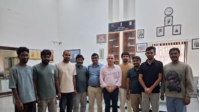 The crew of the tanker Skylight with Indian embassy officials in Muscat, after they were evacuated from the burning tanker. Photo: Sunil Pooniya