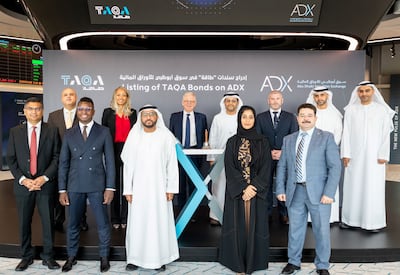 ADX and Taqa officials during the listing of Taqa bonds on the bourse. Photo: ADX