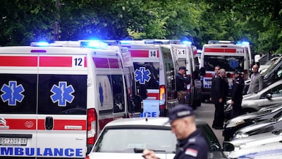 Ambulances and police officers arrive following a shooting at a school in the capital Belgrade on May 3, 2023. - Serbian police arrested a student following a shooting at an elementary school in the capital Belgrade on May 3, 2023, the interior ministry said. The shooting occurred at 8:40 am local time (06:40 GMT) at an elementary school in Belgrade's downtown Vracar district. (Photo by Oliver Bunic / AFP)