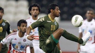 Al Shabab's Mohamed Ahmad controls the ball in last night's match against Al Jazira. Mike Young / The National