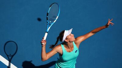 Elise Mertens serves in her semi-final match against Caroline Wozniack. Clive Brunskill / Getty Images