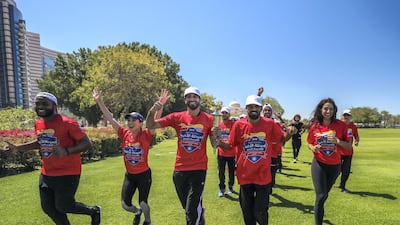 The torch-bearing Special Olympic athletes arrive at Emirates Palace. Victor Besa / The National