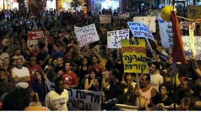 Thousands of Israelis squeeze into Zion Square, Jerusalem, on Saturday calling for changes in government over the rising cost of living in one of several demonstrations in Israeli cities.