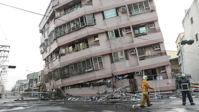 A damaged building is seen after a powerful earthquake hit Tainan, Southern Taiwan on Saturday. The city government said that 24 of the 26 confirmed deaths were from the building collapse. Stringer / Reuters