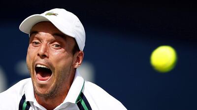 Roberto Bautista Agut on action against Hyeon Chung of South Korea during their second round match of the Dubai Duty Free Tennis ATP Championships in Dubai, United Arab Emirates, 24 February 2016. EPA/ALI HAIDER