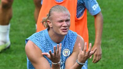 Manchester City's striker Erling Haaland reacts during a training session at the Seoul World Cup Stadium in Seoul AFP