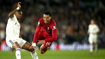 Junior Firpo of Leeds in action against Cody Gakpo of Liverpool. EPA