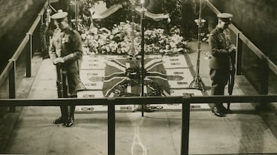 Mourners file past the tomb of the Unknown Warrior at Westminster Abbey, London, 1920