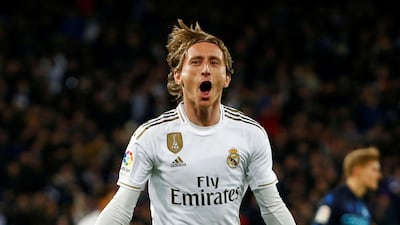 Luka Modric celebrates scoring Real's third from a Gareth Bale cross. Reuters