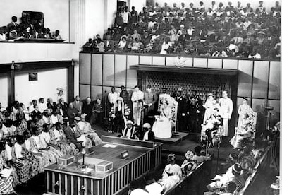 The Duchess of Kent, seated centre on dais, reads a message from the Queen of England in Parliament House at Accra, Ghana, marking the country's independence. AP